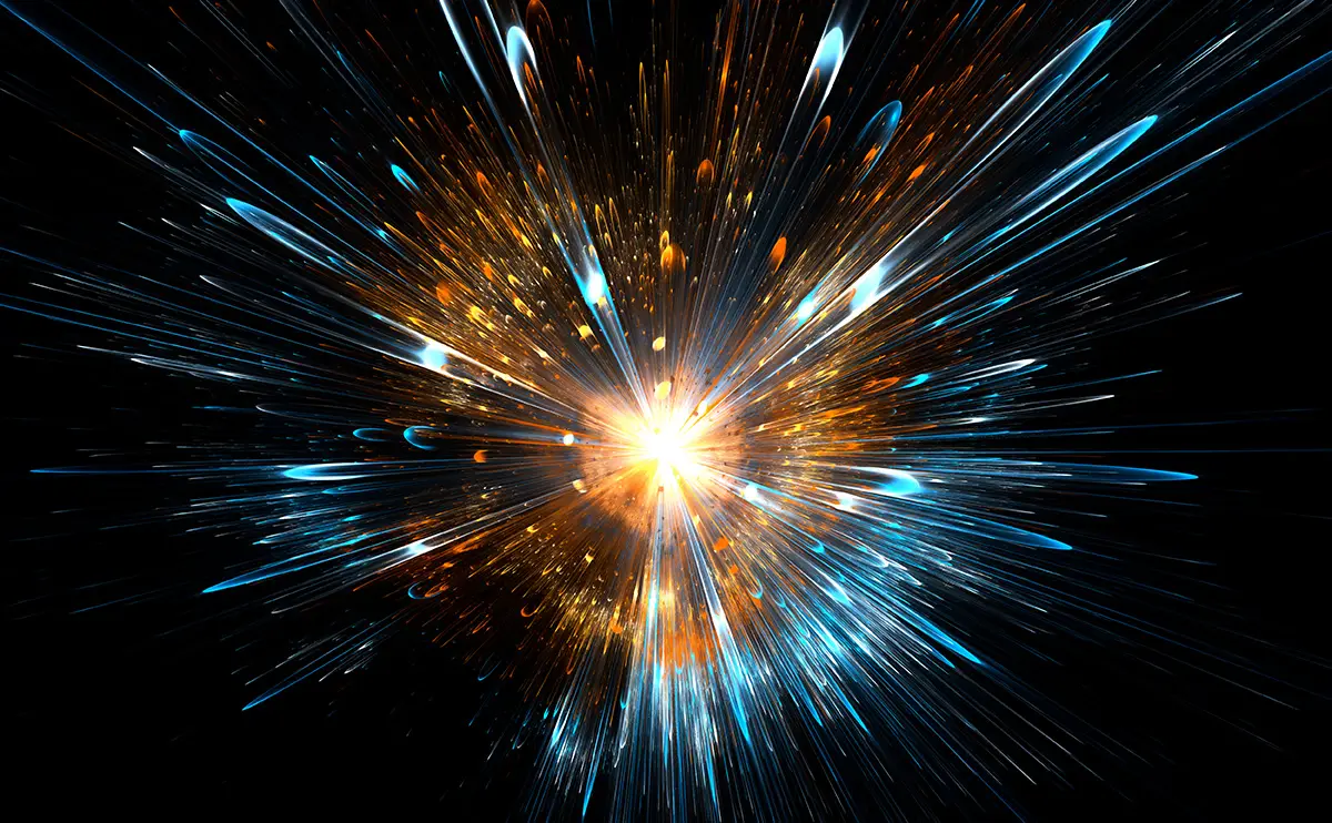 Een felle lichtflits met blauwe, oranje en gele strepen straalt uitwaarts tegen een zwarte achtergrond, wat doet denken aan een abstracte explosie of een afbeelding van de oerknal.